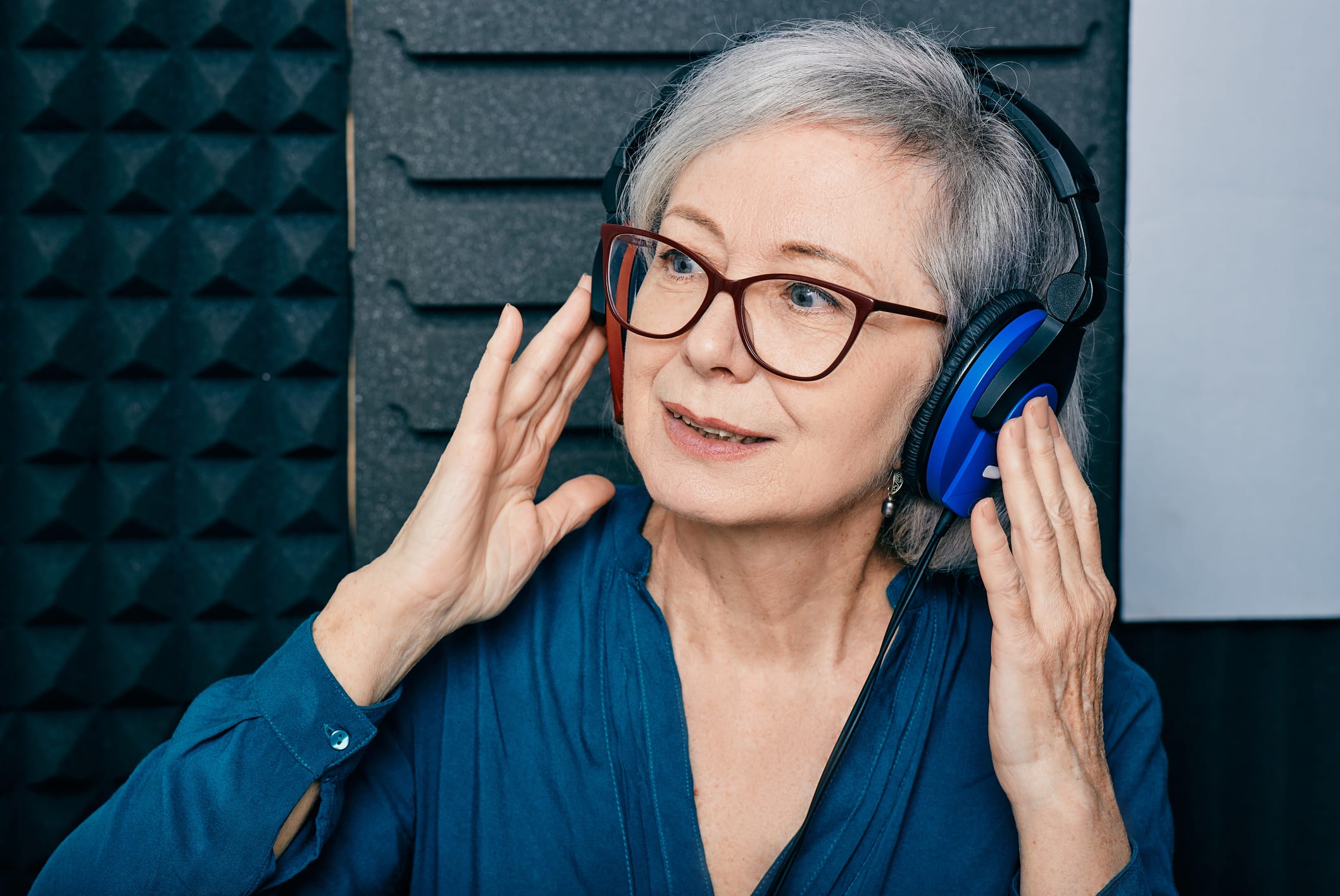 Senior woman taking a hearing test.