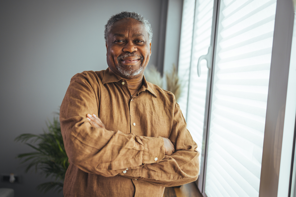 Confident older Black man at home
